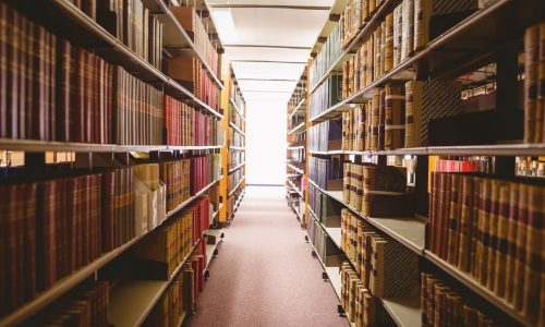 Close up of a bookshelf in library